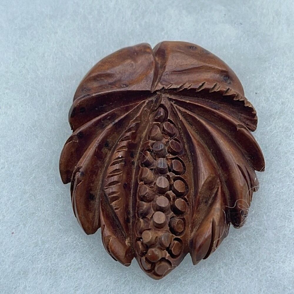 Antique-Vintage hand carved palm tree wood fur dress clip.